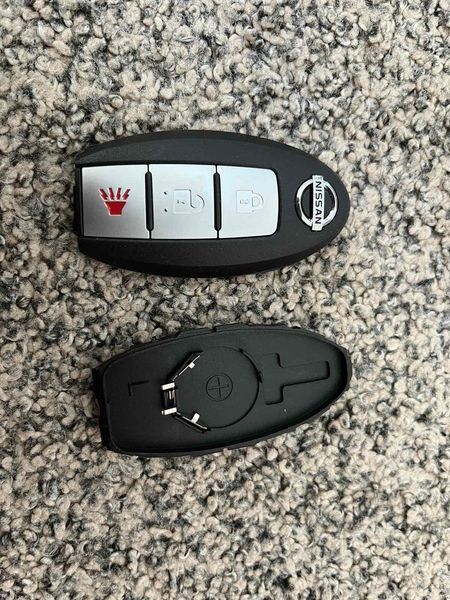 Корпус смарт ключа Nissan AdlerKey (60153-7931) на 3 кнопки (батарея зліва від центру) 362669208 фото